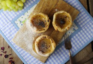 With creamy vanilla custard