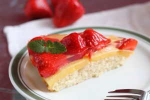 With a creamy custard layer on fluffy sponge cake