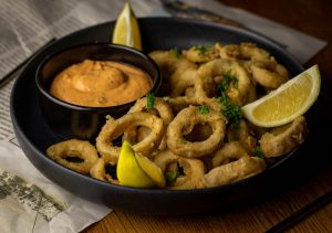 Battered and fried, accompanied by a nice and spicy chipotle aioli