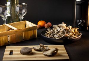 Pulling the oyster mushrooms