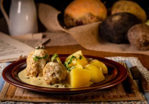 With a creamy aromatic caper sauce