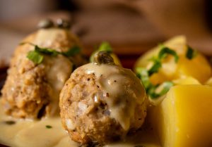 Traditionally served with cooked potatoes