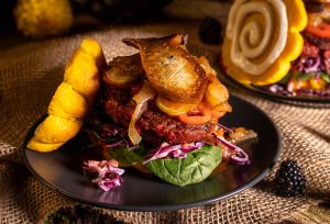 A seasonal burger with regional produce inside