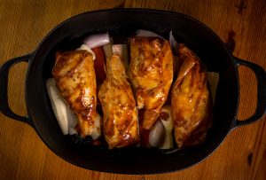 The raw vegan goose legs in the roaster. Ready for the oven.