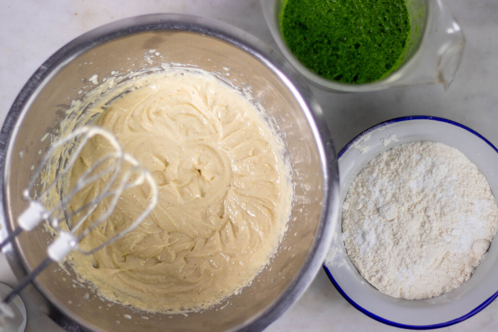 4. Stir in the mixed chickpea flour, then gradually mix in the flour and herb milk alternately.