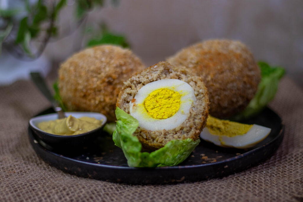 In the UK, Scotch eggs can be bought ready-made in supermarkets and they are a popular snack. But they are not vegan.