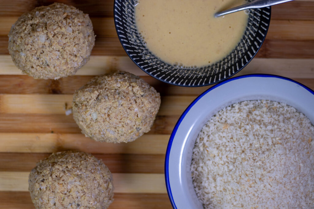 7. Now the vegan Scotch eggs can be breaded.